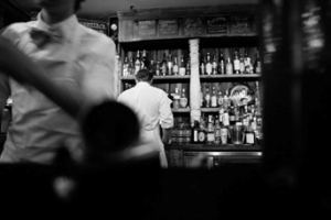 waiters in restaurant black and white