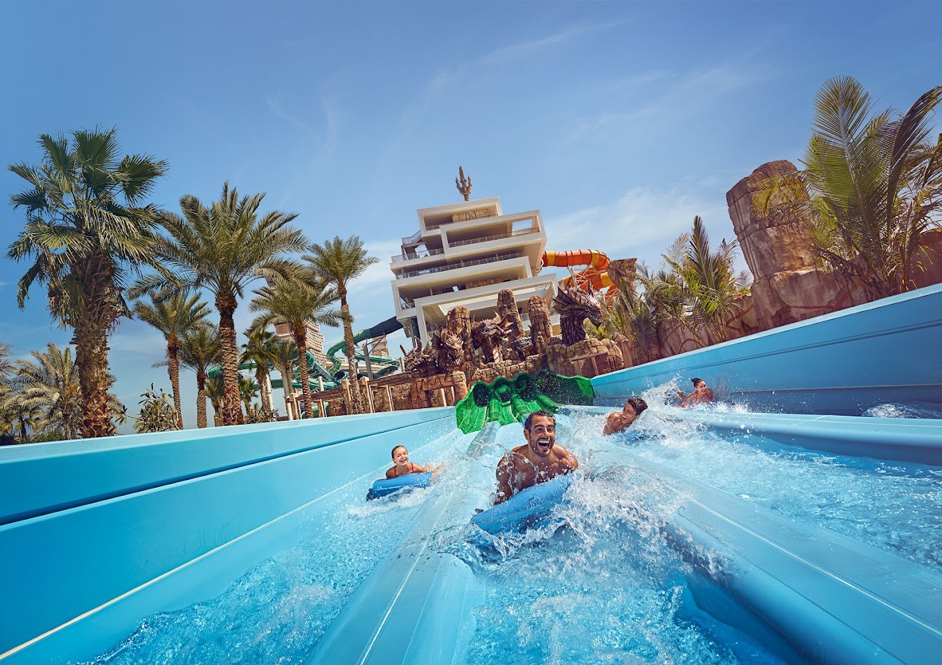 A man sliding down the water slide at Aquaventure waterpark