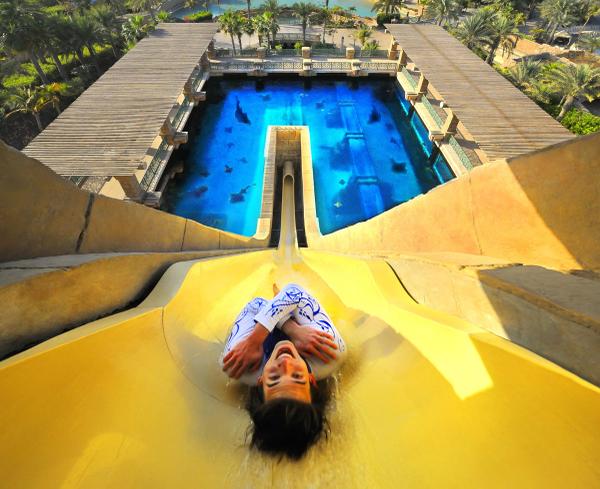 A woman slides down the gravity-defying ride and is headed straight to the waters