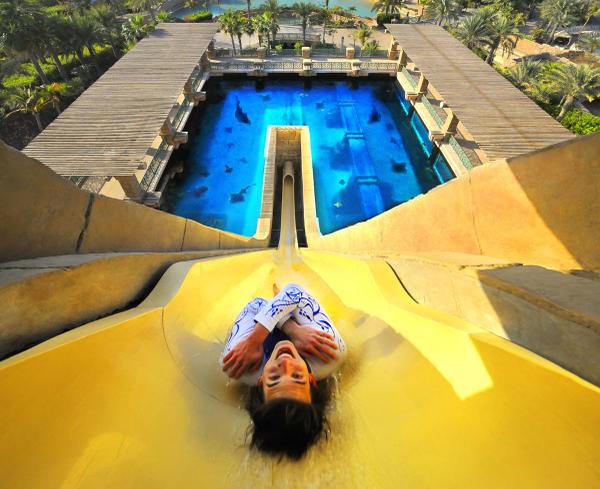 A woman slides down the gravity-defying ride and is headed straight to the waters