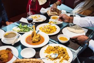 Family enjoying indian food