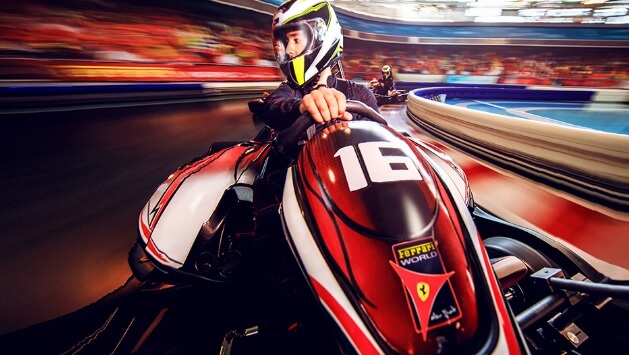 A man in a Ferrari motorcycle