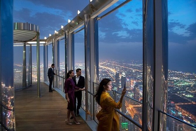 Sky Deck in the evening as visitors witness the sea of city lights from above